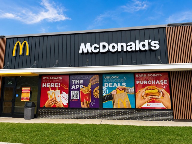 McDonald’s storefront windows covered with app, deals and Rewards graphics