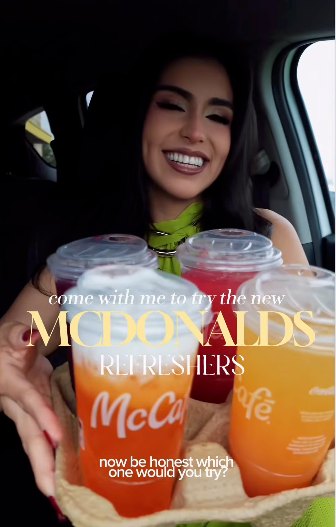 A Laredo creator holding a McDonald’s Refreshers drink in a vertical Reel